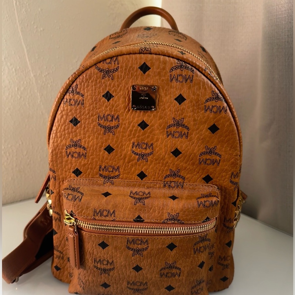 MCM Stark Side Studs Backpack in Visetos-Cognac with original dust bag.